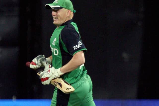 Kevin O'Brien celebrates his fastest ever World Cup century against England. Picture: INPHO/Sportzpics