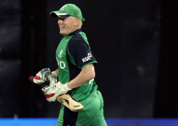 Kevin O'Brien celebrates his fastest ever World Cup century against England. Picture: INPHO/Sportzpics
