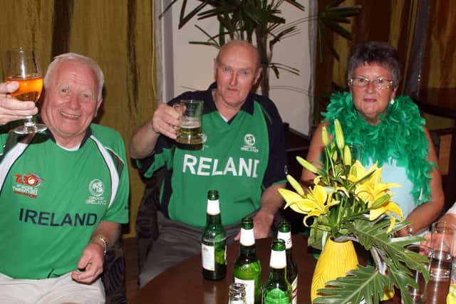 Roy Harrison, Irvine McKnight and Muriel Harrison celebrating the victory