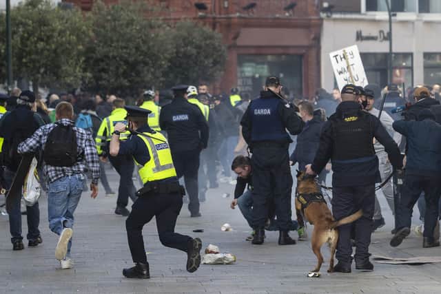 Protesters and Gardai clashing during an anti-lockdown protest in Dublin city centre. Photo: Damian Eagers/PA Wire
