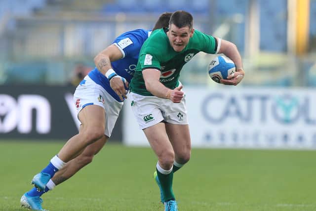 Johnny Sexton of Ireland is tackled by Stephen Varney of Italy during the Guinness Six Nations match at Stadio Olimpico in Rome. (Photo by Paolo Bruno/Getty Images)