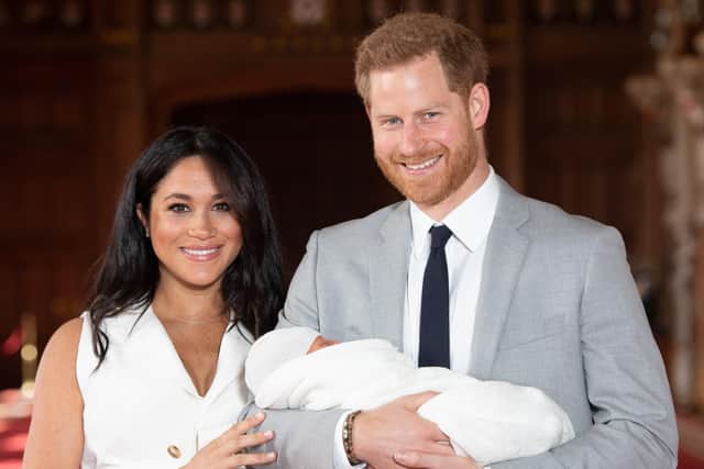 Harry and Meghan with Archie as a baby