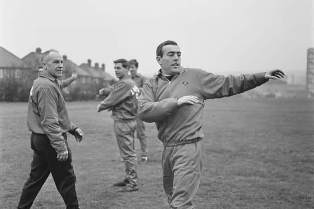 Bill Shankly watches Ian St John during a training session in January, 1967