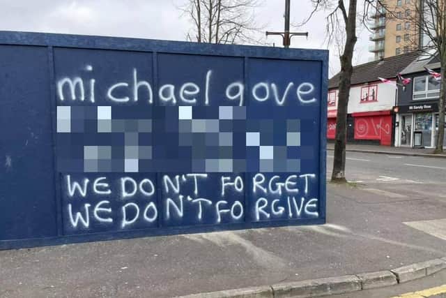 The graffiti appeared in the staunchly loyalist area of Sandy Row in Belfast.
