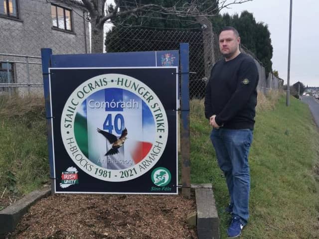 Pomeroy community representative Ian Irwin pictured beside the poster in Pomeroy.