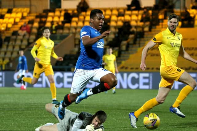 Rangers' Alfredo Morelos (top) before being shown a yellow card for diving