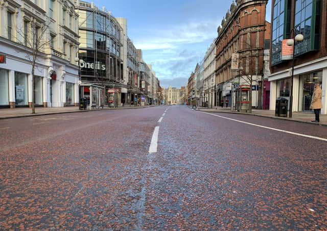 Belfast city centre in lockdown last month, deserted in the way it has been for most of the last year. Dr McCloskey writes: "When the economic and health effects of this debacle are assessed, the lost livelihoods and despair, then we can ask what went wrong"