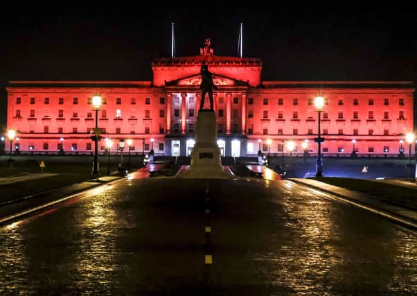 Stormont in illuminated red in 2019 to mark  European Day of Remembrance for Victims of Terrorism. Photo: Bob McEvoy