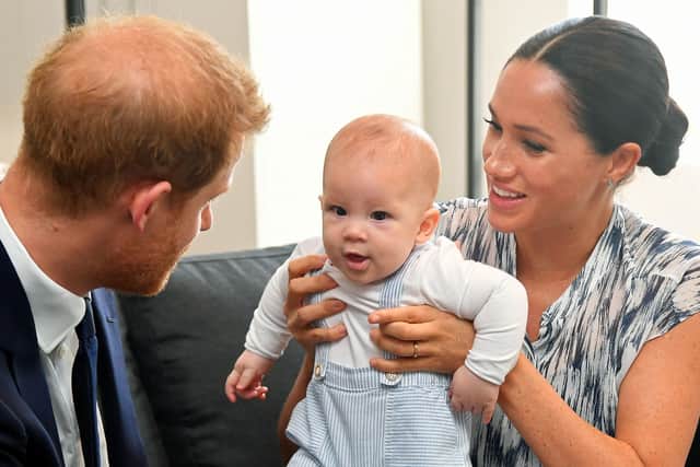 File photo dated 25/09/2019 of the Duke and Duchess of Sussex holding their son Archie during a meeting with Archbishop Desmond Tutu and Mrs Tutu at their legacy foundation in cape Town, on day three of their tour of Africa