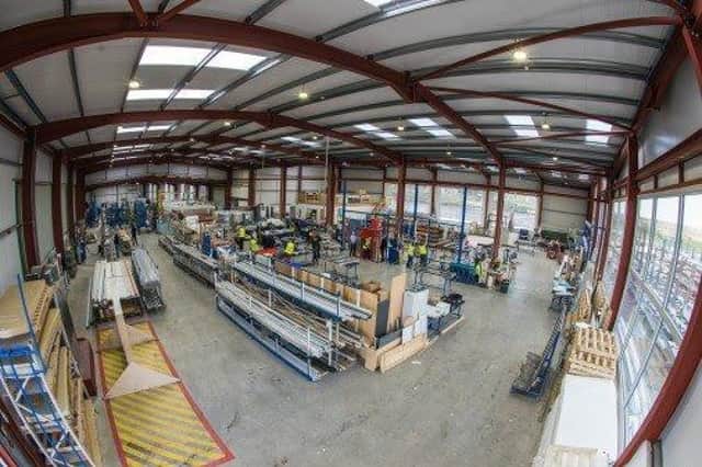 Mid and East Antrim firm Apeer Doors have much to celebrate after successfully completing their new 20,000ft2 factory extension