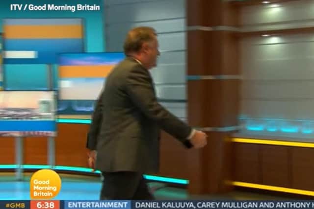 Video grab taken from ITV of presenter Piers Morgan walking off set during a discussion about the Duchess of Sussex with his colleague, Alex Beresford, the morning after the UK broadcast of the Duke and Duchess of Sussex interview with Oprah Winfrey.