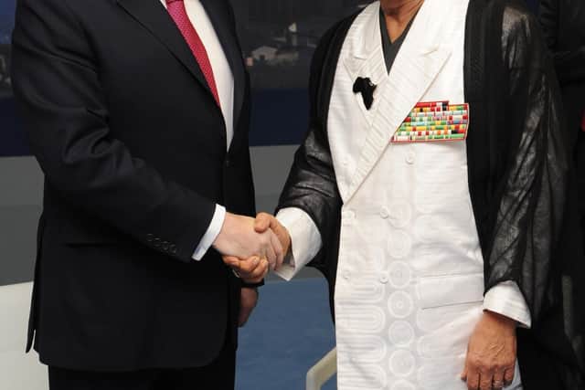 Former Prime Minister Gordon Brown meeting Muammar Gaddafi at the G8 Summit in L'Aquilla in 2009.