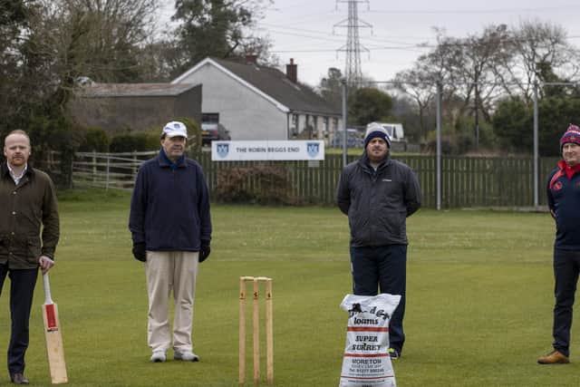 UUP MLA John Stewart, President of the Northern Cricket Union (NCU) Roger Bell, NCU Grounds Committee Member Michael Kennedy and NCU Cricket Operations Manager Uel Graham on the crease of Carrickfergus Cricket Club.