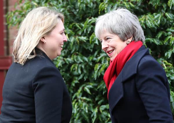 Denzil Davidson spent three years as Europe advisor to Theresa May (right), seen here with former NI secretary of state Karen Bradley