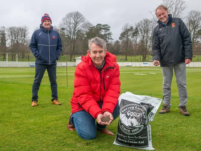 Minister Edwin Poots at Lisburn Cricket Club with Uel Graham, left, of the Northern Cricket Union and Lisburn's Dean Simpson