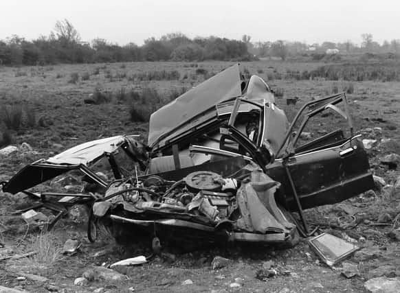 The wreckage of a police car that was blown up by an IRA landmine at Kinnego Embankment in 1982. Three RUC officers died in the explosion