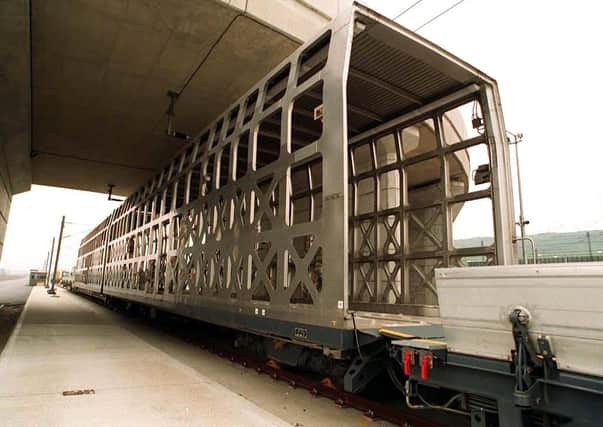 If there was a rail tunnel to Scotland there would be a freight terminal in the Belfast area where freight vehicles would load on to shuttle trains, like the Channel Tunnel train pictured