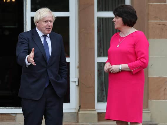 Prime Minister Boris Johnson and First Minister Arlene Foster pictured during a visit to Northern Ireland in 2020.