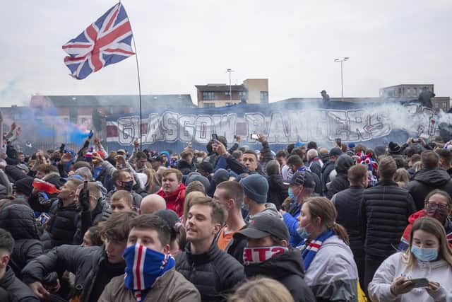 Rangers fans outside Ibrox stadium in Glasgow last weekend. Tim McGarry writes: "It’s understandable the fans got a little exuberant winning the Scottish Premier League. But the Covid breaches were blatant. Thankfully Cliftonville insist on keeping their fans safe by refusing to win the Irish League"