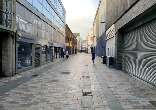 A deserted Belfast city centre earlier this year. We are being told that shops in Northern Ireland might not be able to open until the Republic catches up in the vaccine rollout