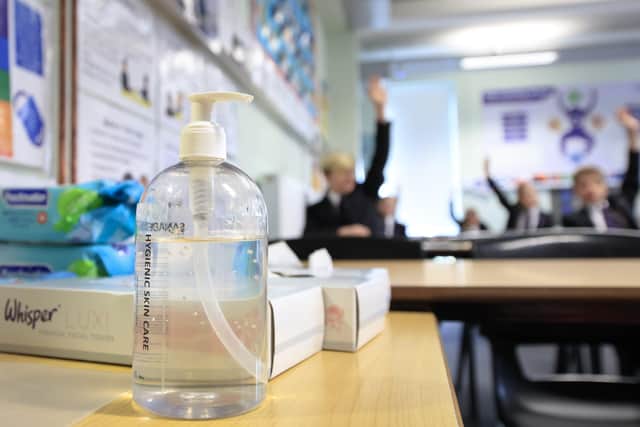 Hand sanitiser in a classroom
