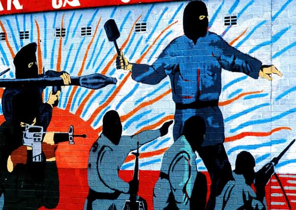 A republican mural in west Belfast. Dr Funston, whose brother was murdered by the IRA, writes: "Twenty-three years after the Belfast Agreement, the Provos should have left the stage, as well as the other so-called paramilitary groups. Yet they still spin their web"