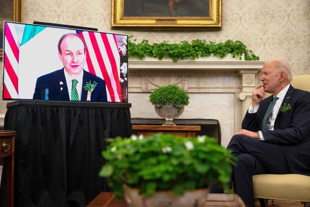 US President Joe Biden hosts Irish Prime Minister Micheál Martin (L on screen) during a virtual bilateral meeting for St. Patrick's Day at the White House in Washington, DC, on March 17, 2021. (Photo by JIM WATSON / AFP) (Photo by JIM WATSON/AFP via Getty Images)