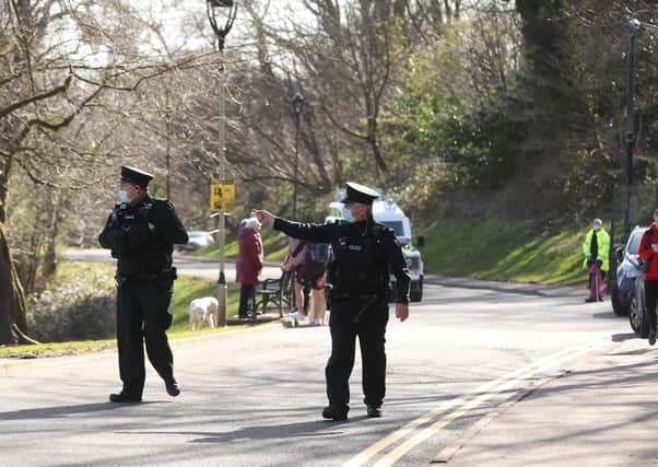 Members of the PSNI patrol at Belfast Castle during Northern Ireland's national lockdown to curb the spread of coronavirus which has been extended again until April 1. Picture: Niall Carson/PA Wire