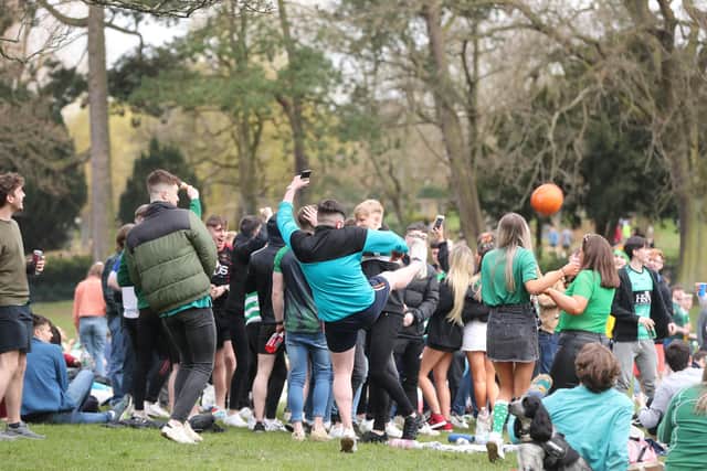 People out in the Botanic Gardens in Belfast, on St Patrick's Day. Picture date: Wednesday March 17, 2021. PA Photo. See PA story ULSTER Coronavirus. Photo credit should read: Niall Carson/PA Wire