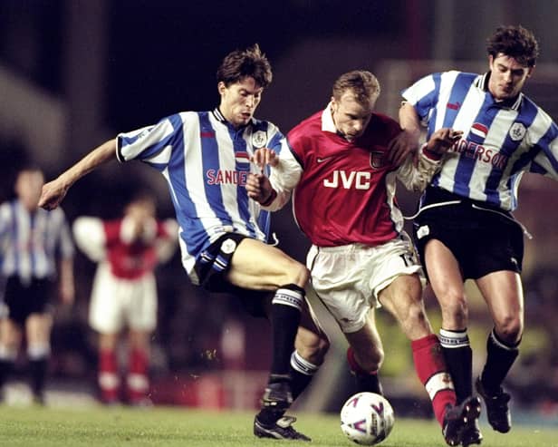 Danny Sonner (right) and Sheffield Wednesday team-mate Petter Rudi battle with Arsenal’s Dennis Bergkamp in 1999. Pic by Getty.