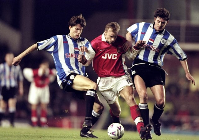 Danny Sonner (right) and Sheffield Wednesday team-mate Petter Rudi battle with Arsenal’s Dennis Bergkamp in 1999. Pic by Getty.