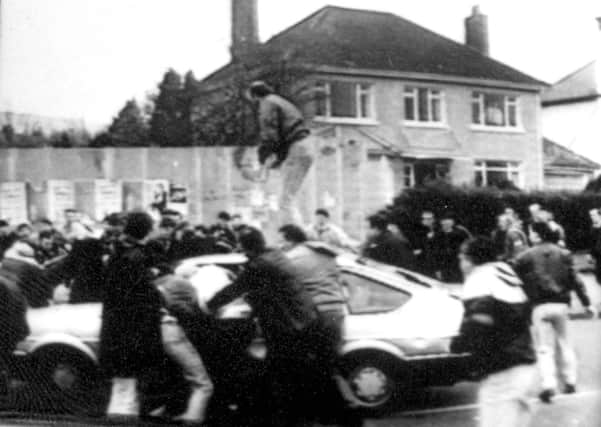 The chief constable Simon Byrne was in a virtual meeting with Harry Maguire, who was found guilty of 1988 IRA corporal murders in west Belfast, above. The British Army corporals Derek Wood and Corporal David Howes were trapped in their car before being tortured and shot after they ran into the funeral of an IRA man