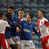 Glen Kamara of Rangers clashes with Ondrej Kudela of Slavia Praha