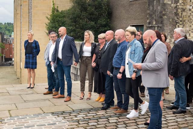 Detective Inspector Gemma Hunter, Greg Llewellyn, Dean Radford,  Lee Smith, Dion Raitt, Bill Seymour atop the courthouse steps at Winchester Crown Court after the sentencing of Bob Higgins
