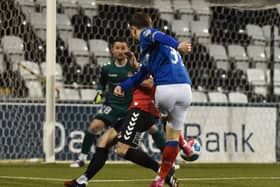 Joel Cooper scores for Linfield before team-mate Shayne Lavery secured the 2-1 victory over Crusaders. Pic by Pacemaker.
