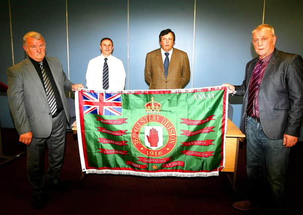 The Somme flag of 2016: L-R Jim Wilson, former Red Hand Commando internee, Wiston Irvine of the UVF-linked PUP, David Campbell (who has no paramilitary affiliations), and Jackie McDonald of the UDA-linked UPRG
