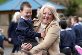Diane Dawson, principal of  Braniel Primary School in Belfast welcomes Theodore McArthur-Collen back to class this morning after the lockdown break.PICTURE BY STEPHEN DAVISON