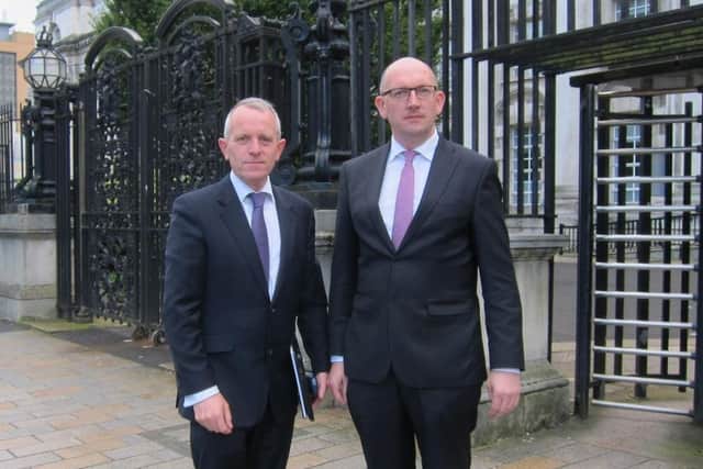 Tom Forgrave, right, is a poultry farmer from Ballymoney and is a director of the Renewable Heat Association. Pictured with Andrew Trimble, who is chair of the association, outside the High Court in Belfast during one of their legal challenges to RHI changes