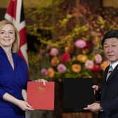 International Trade Secretary Liz Truss signing the UK-Japan Comprehensive Economic Partnership Agreement (CEPA)