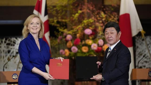 International Trade Secretary Liz Truss signing the UK-Japan Comprehensive Economic Partnership Agreement (CEPA)