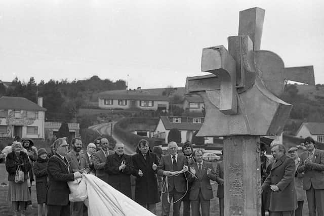 Mr Eddie McGraddy, chairman of Down District Council unveils a cross at Roughal Park, Downpatrick, Co Down, on St Patrick's Day in March 1982.. The £2,000 monument was sculptured by Belfast artist Bob Sloan and commissioned by the council of the Arts Council. It was based on an ancient Irish high cross. Pictures: Trevor Dickson/News Letter archives