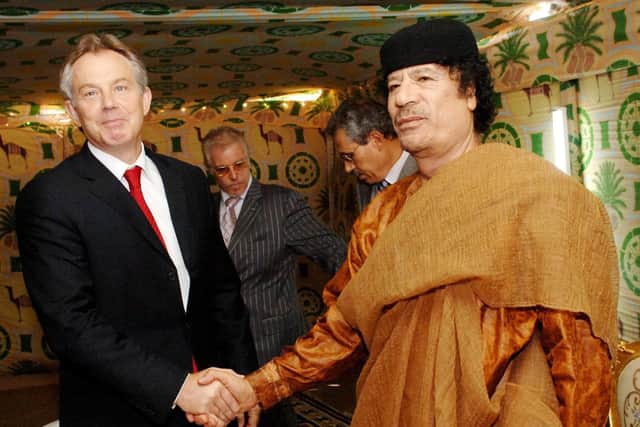 Prime Minister Tony Blair meeting Libyan leader Colonel Muammar Gaddafi at his desert base outside Sirte south of Tripoli in 2007. Photo: Stefan Rousseau/PA Wire