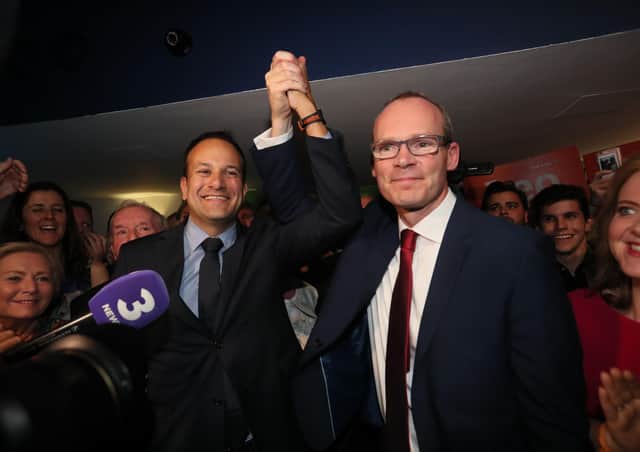 Simon Coveney (right) congratulates Leo Varadkar as Ireland's new prime minister in June 2017. That summer, when Stormont was down due to Sinn Fein, Mr Coveney told RTE he backed their demand for an Irish language act. Leo Varadkar later said the same. Neutral British ministers said nothing in response