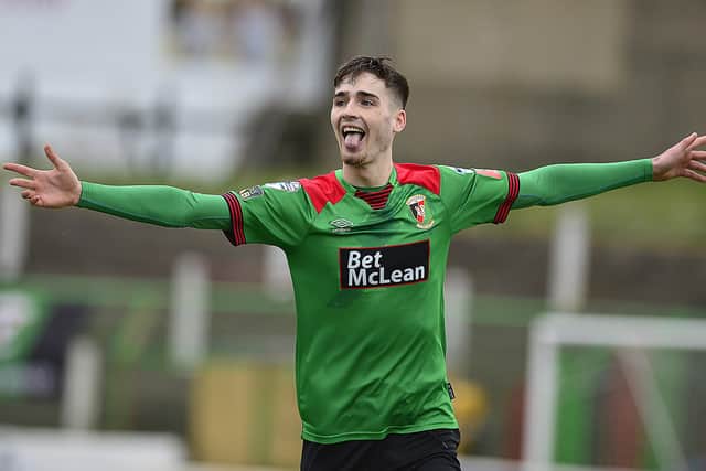 Jay Donnelly following his injury-time goal for Glentoran against Crusaders. Pic by Pacemaker.