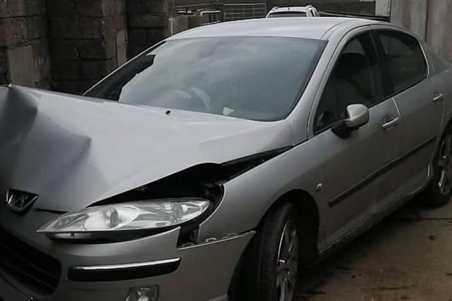 Damaged car seized by police.