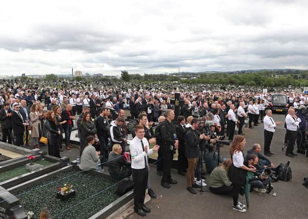 A crowd listens to former Sinn Fein president Gerry Adams speak during the funeral of Bobby Storey at Milltown cemetery in west Belfast on June 30, 2020. Photo: Liam McBurney/PA Wire