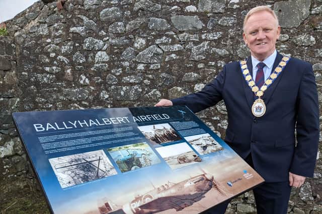 The Mayor of Ards and North Down, Councillor Trevor Cummings, beside the new lectern in Ballyhalbert which is dedicated to Polish airmen from WWII.