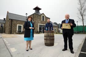 Pictured at the official opening of Hinch Distillery are Economy Minister Diane Dodds, Head Distiller at Hinch Aaron Flaherty and owner Dr Terry Cross OBE