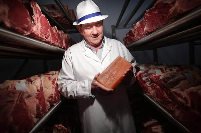Peter Hannan of Hannan Meats and the Meat Merchant retail operation in Moira selecting meat in the vast Himalayan salt chamber for the company’s premium meat boxes
