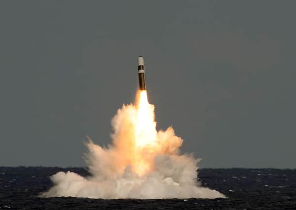An unarmed Trident II (D5) ballistic missile, during a UK test launch in the Atlantic in 2012. In 2010 the government planned to cut its nuclear warhead stockpile from 225 to 180, the maximum figure is now to increase to 260: Photo: PO(Phot) Lockheed Martin/ MoD Crown Copyright/PA Wire